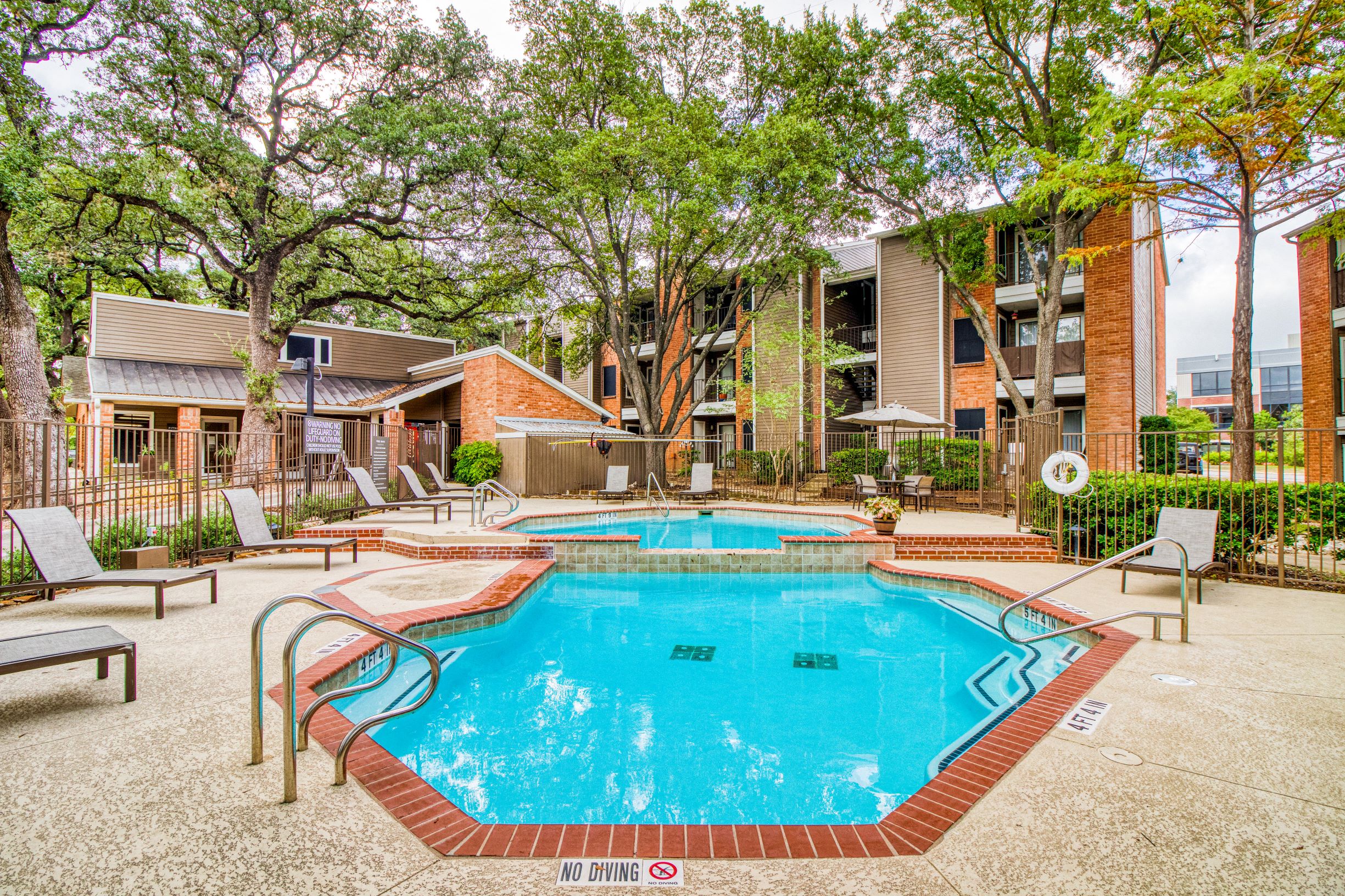Pool area at Village Oaks Apartments, Austin, TX